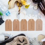 Unsorted waste on white stone background