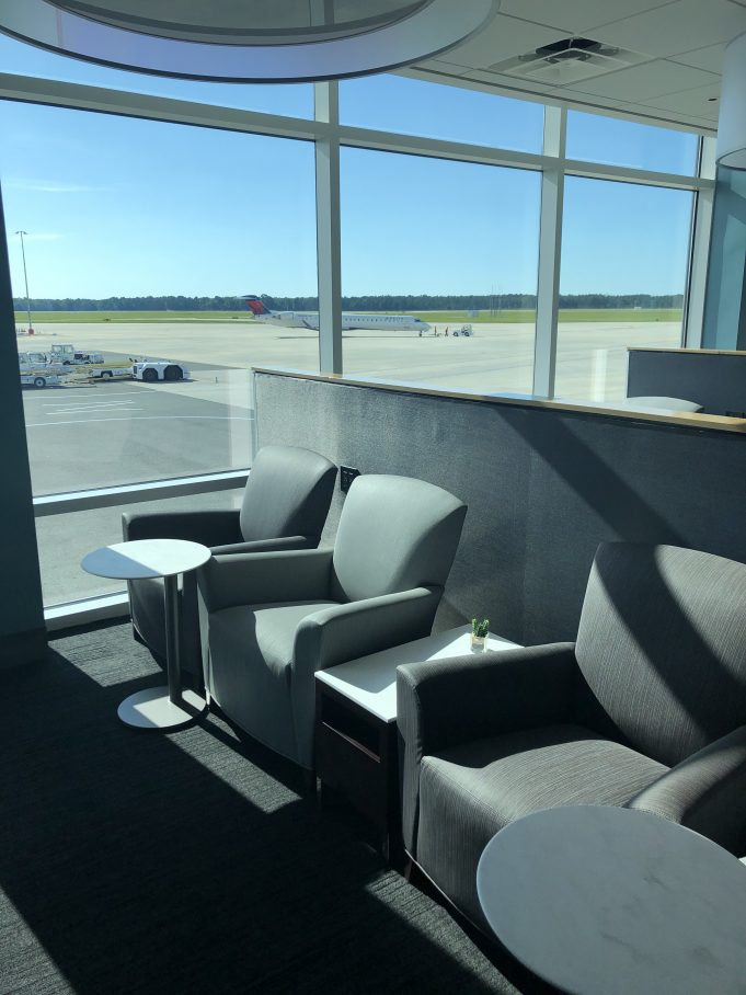 The Club JAX, the airport's newest lounge, offers guests the chance to refresh, recharge, and